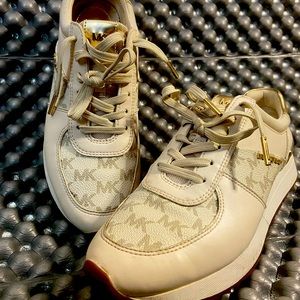 Women’s size 6 Michael Kors tan and gold tennis sneaker